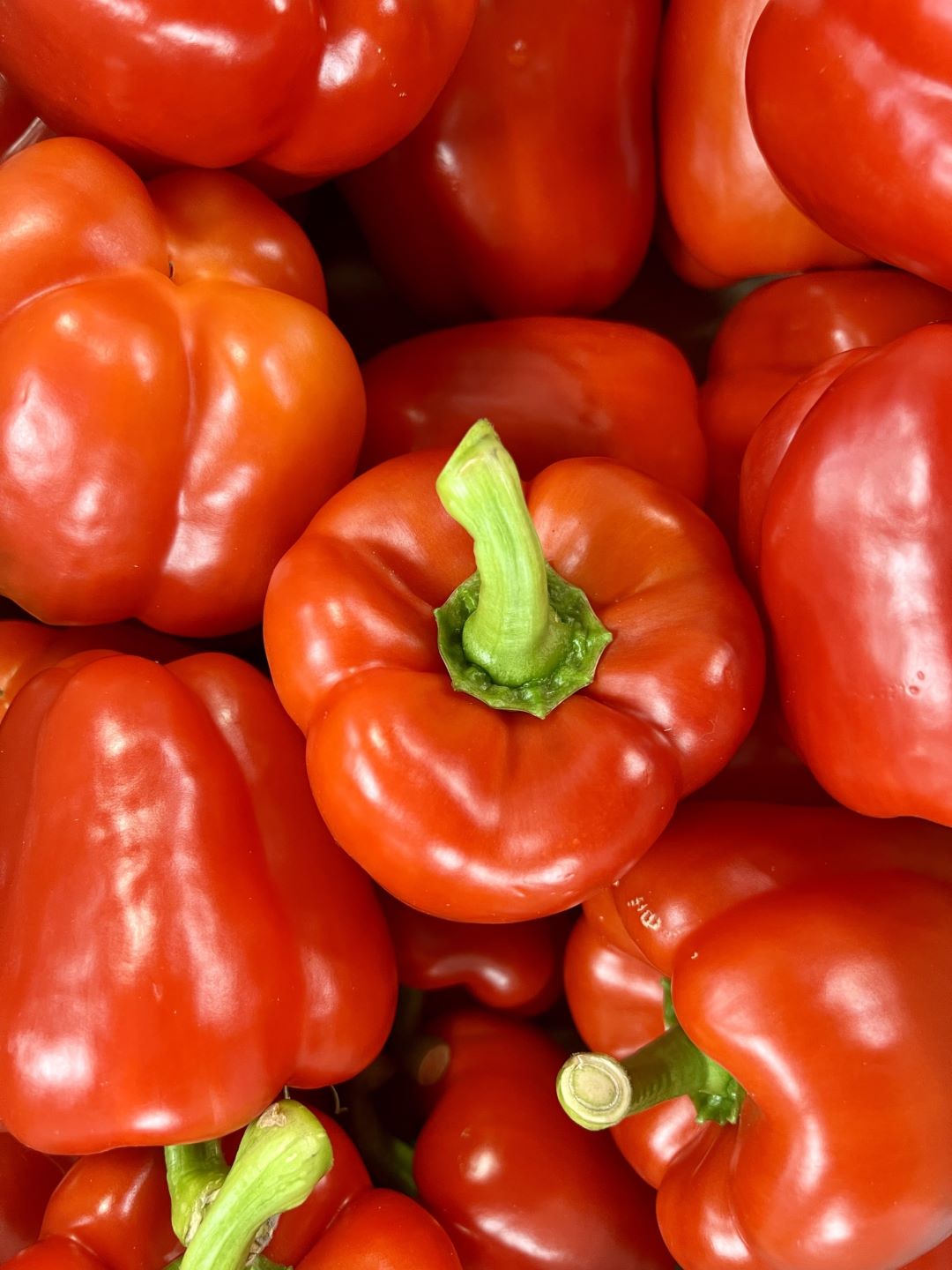 Picture of fresh red bell peppers from the market by Don't tell my sisters